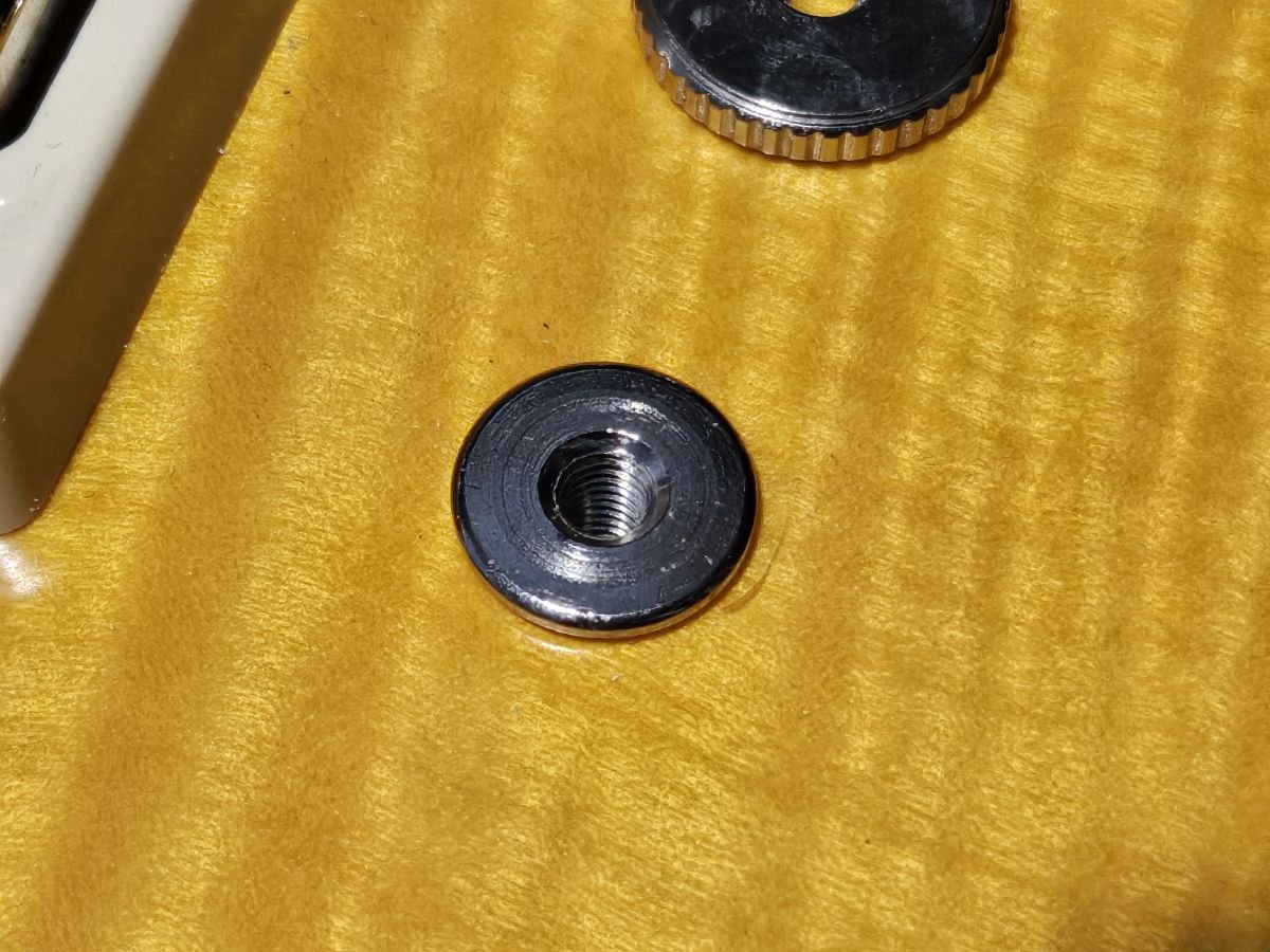 Small Metal Bushing Mounted in Body